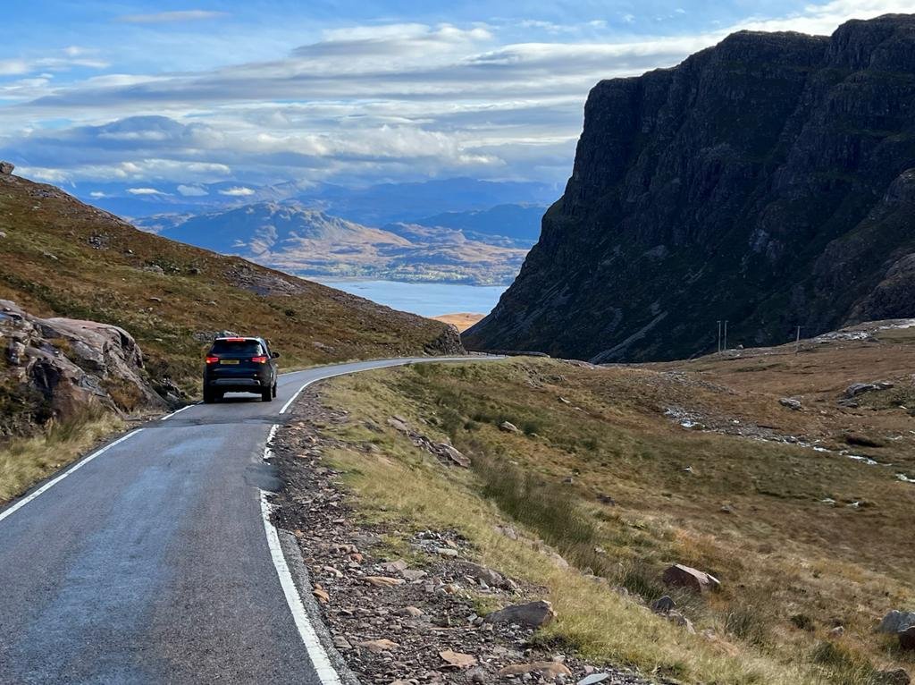 Approaching the Five Sisters of Kintail in a Celtic Routes Land Rover