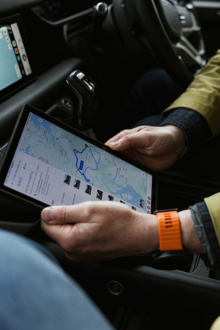 Couple in a Celtic Routes Land Rover viewing the app