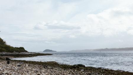 Coastal landscape with the sea and rocky beach