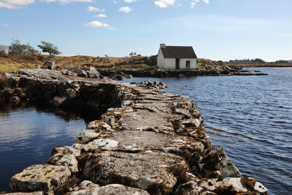Stone causeway leading to a cottage on the Connemara coast