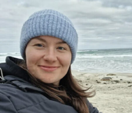 Hannah Barnwell on a beach