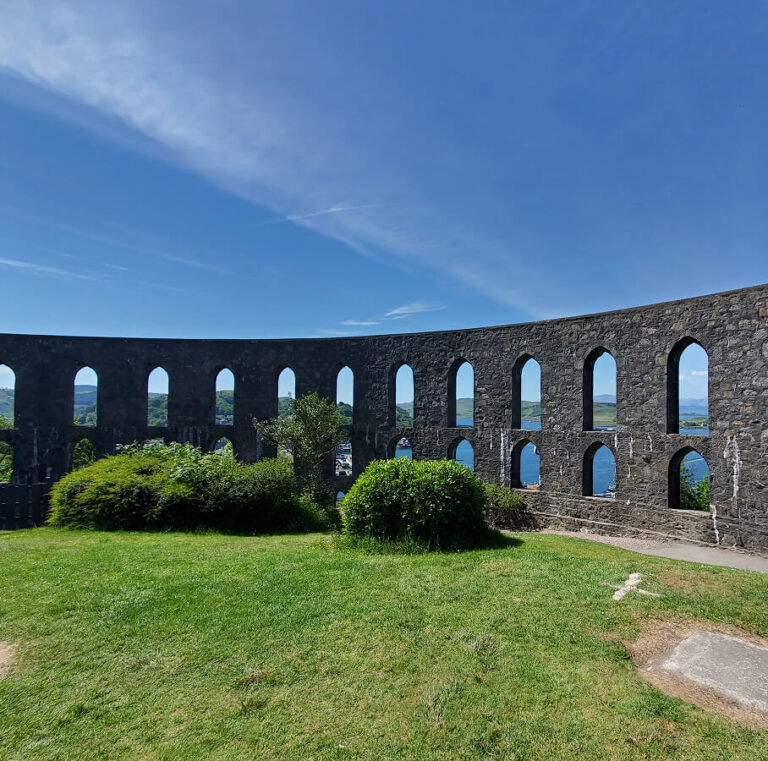 McCaig's Tower in Oban under a blue sky